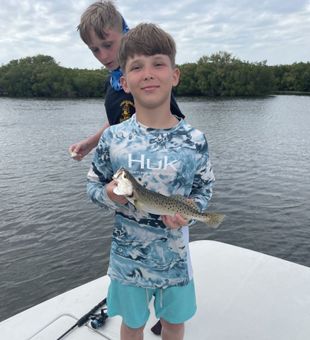 Family fishing fun in the beautiful waters of Crystal River — making memories one cast at a time. 🎣