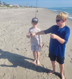 Proud Young Surf Fishing Catch
