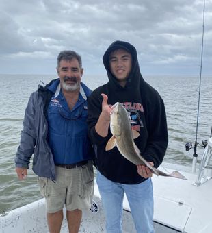 Redfish action heats up in the Laguna Madre on a South Padre Island fishing charter.