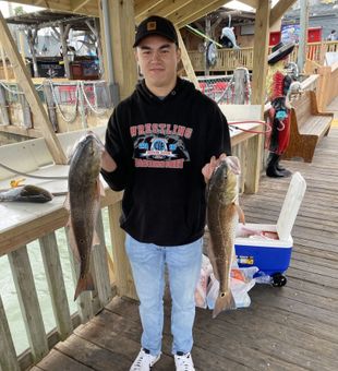 Casting for redfish in the calm, productive waters of Laguna Madre, Texas.