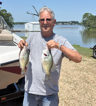 Hooked a couple slick white crappie with some sweet jigging and trolling moves!
