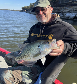 Nice white crappie using light tackle jigging techniques!