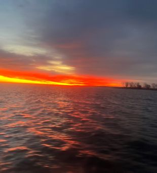 Golden hour magic on Bay City waters.