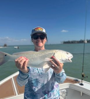 Reeling in a redfish with a perfect view!