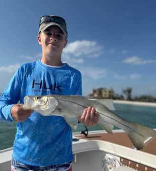 Young angler with a snook catch!