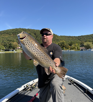 Nice sea trout using light tackle jigging in clear conditions!