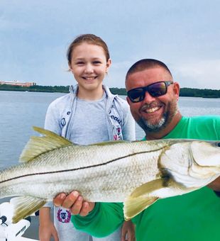 Grinning with a giant Snook!