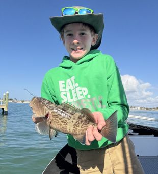 Young Angler and his Grouper Catch! - St. Petersburg, FL.