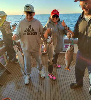 Great day on the water with three fish caught using deep sea trolling and heavy tackle under clear skies!