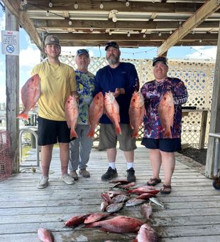 Solid Red Snapper haul with the crew.