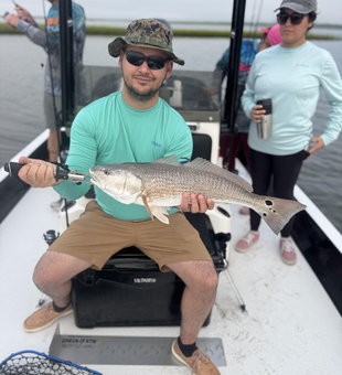 Huge redfish caught with light tackle as skies clear!
