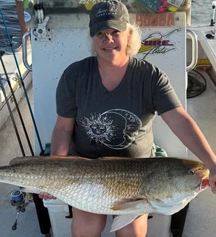 Nothing beats a Trophy Redfish Catch before ending the trip- Greenville, NC.