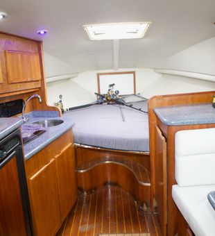 Comfortable fishing boat cabin ready for Tamarindo adventures.