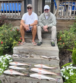 We both limited out on redfish today!