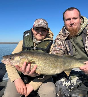 Massive walleye moment for this proud duo!