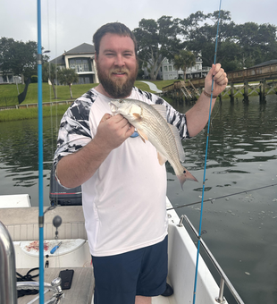 Reeled in a feisty redfish on a beautiful day in Wilmington!