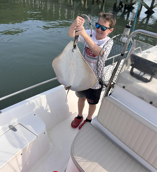 Nice stingray catch using light tackle near the dock!