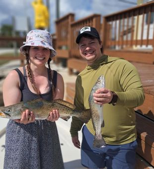 Double speckled trout success in Oak Hill waters!