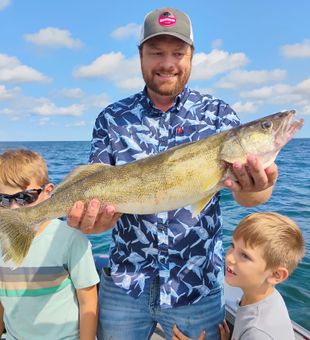 Beautiful walleye moment with the family!