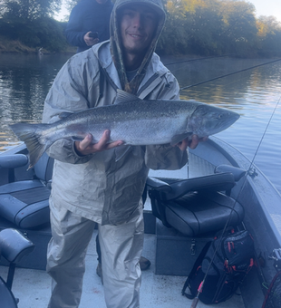 Nice Chinook salmon caught using jigging and trolling techniques in clearing weather conditions.