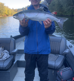 Nice coho salmon using jigging and trolling techniques. Weather cleared up nicely this afternoon.