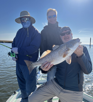 Nice redfish caught using deep sea jigging techniques on partly cloudy day