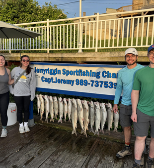 Reeling in a Chinook Salmon while trolling on Lake Michigan!
