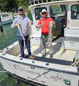 Great striped bass action using light tackle and trolling techniques!