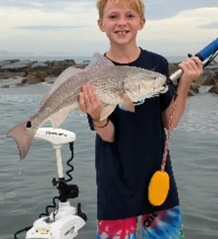 Edgewater redfish making the day unforgettable!