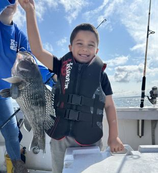 Proud moment with a chunky Black Sea Bass!