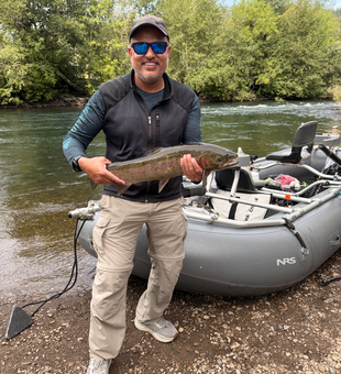 Beautiful Oregon rainbow trout caught using bait casting technique!