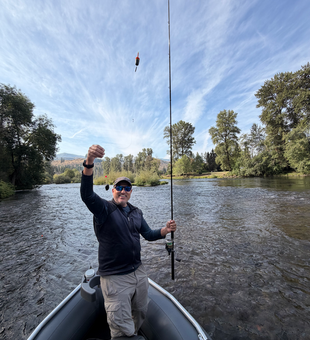 Bait casting action on Oregon waters under clearing skies.