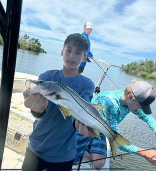 Reeling in the big catch on a perfect Cape Coral