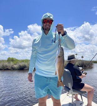 Exciting Redfish catch on Florida inshore fishing trip!