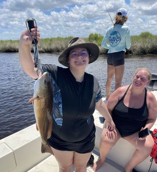 Exciting Redfish catch on Florida inshore fishing trip!