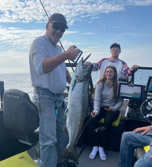 Landing trophy salmon on the Great Lakes in Michigan.