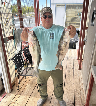 Double trouble: Two Striped Bass caught in stormy Madill!
