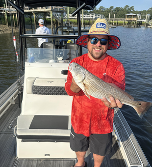 Storms brewing, but the redfish are biting at 124 Palmetto Dr!