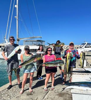 Big smiles and bigger mahi mahi.