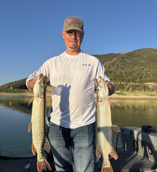 Nice pair of Northern Pike using deep sea jigging and trolling techniques in clear conditions!