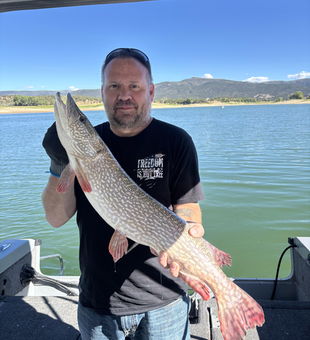 Nice Northern Pike caught using deep sea jigging in partly cloudy conditions!
