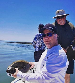 16 1/2 inch flounder caught using cut mullet! 