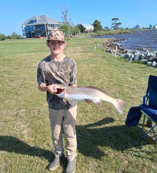 Little hands, big redfish