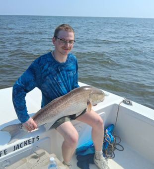 "Landed a monster red drum out on the water today! Incredible fight and an even better day of fishing."