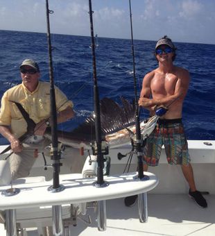 An epic battle offshore ends in victory with this beautiful sailfish! Nothing beats the thrill of the fight and the reward at the end of the line.