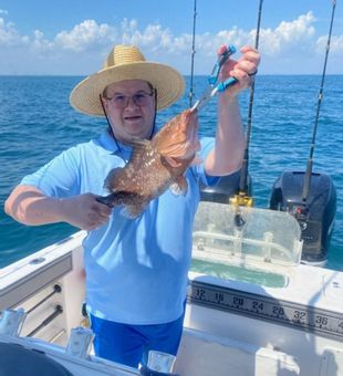 Sunrise offshore charter out of Fort Pierce, Florida — rods bent all morning.