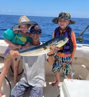 Happy Mahi Mahi family catch