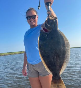 Confident flounder catch — well-earned!