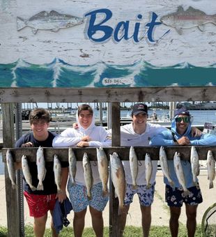 Casting lines and making memories while fishing Port Aransas, Texas.