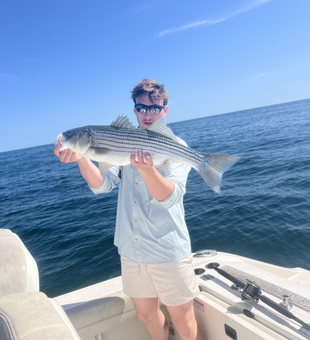 Big 27-inch Striped Bass hooked while jigging off Yarmouth!